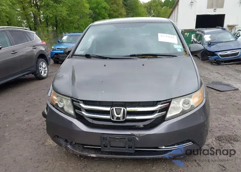 2014 Honda Odyssey Lx z USA, uszkodzony, nr VIN 5FNRL5H24EB129725